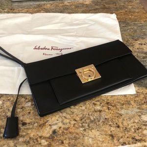 Nwt Authentic black leather clutch/wristlet